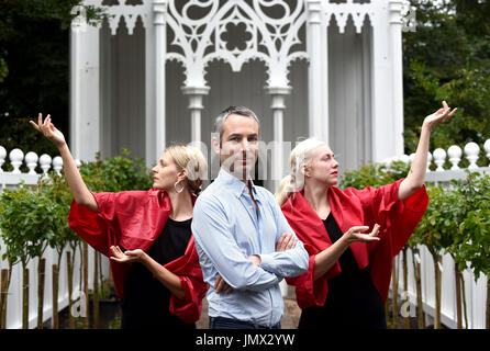 A rehearsal of Pablo Bronstein's (centre) ballet The Rose Walk is performed by classically trained dancers Rosalie Wahlfrid and Emilia Gasiorek (left) at the Jupiter Artland in West Lothian, which was commissioned for this year's Edinburgh Art Festival. Stock Photo