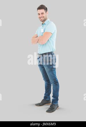 Digital composite of Full body portrait of Man standing with grey background Stock Photo