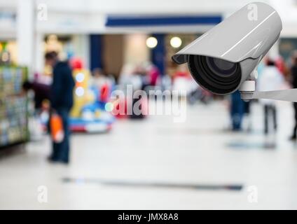 Digital composite of cctv, blurred store Stock Photo