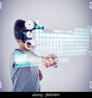 Keyboard interface against schoolboy using virtual reality headset Stock Photo