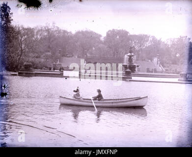Antique c1910 photograph, boaters in The Lake, in front of Bethesda Terrace and Fountain in New York City's Central Park. SOURCE: ORIGINAL PHOTOGRAPH. Stock Photo