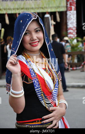 Smiling Kadazan Dusun girl in traditional costume Stock Photo - Alamy