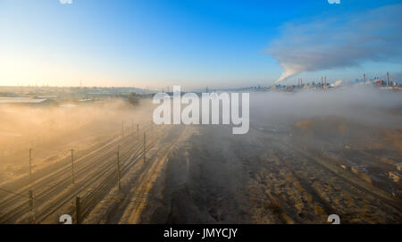 Smoke emission from factory pipes Stock Photo