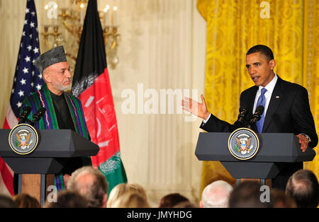 United States President Barack Obama, right, conducts a joint press conference with President Hamid Karzai of Afghanistan, left, in the East Room of the White House in Washington, DC on Wednesday, May 12, 2010. Credit: Ron Sachs / CNP