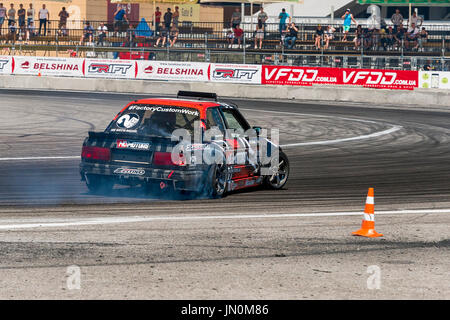 Lviv, Ukraine - June 10, 2017: Unknown rider on the car brand BMW overcomes the track in the championship of Ukraine drifting in Lviv, Ukraine. Stock Photo