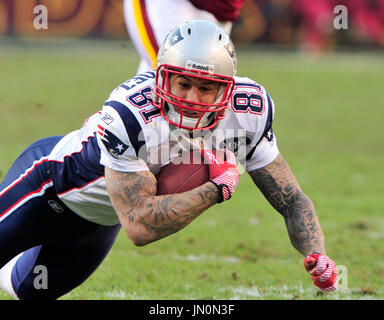 Tight end Aaron Hernandez (81) of the New England Patriots celebrates his  touchdown against the New York Giants on the opening drive of the second  half in Super Bowl XLVI at Lucas