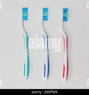 3 toothbrushes on clean background Stock Photo