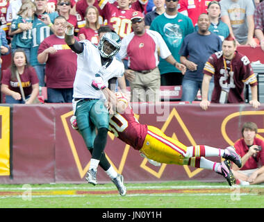 Philadelphia Eagles quarterback Vince Young throws the ball as he warms up  before an NFL football game with the San Francisco 49ers Sunday, Oct. 2,  2011 in Philadelphia. (AP Photo/Julio Cortez Stock