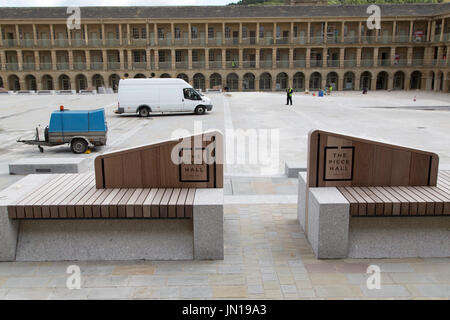 Halifax, UK. 28th July, 2017. New benches at the Piece Hall in Halifax, England. The Grade-I listed building has undergone a two-year restoration costing £19 million and will re-open to the public on Yorkshire Day (1 August) 2017. Credit: Stuart Forster/Alamy Live News Stock Photo