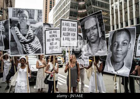 New York, New York, USA. 28th July, 2017. (Photo: Sachelle Babbar) In protest the policies of the Trump Administration and threats to various communities in America, artists, activists, and community members participated in a solidarity march to bring attention to those marginalized. The platforms were: respect for lives, economic and social equality, diversity, and freedom of expression. The participants marched in silence in white attire, in homage to the 1917 Silent Protest Parade. Kindred Arts was the event organizer. The Silent Parade was a silent protest march of 8,000-10 Stock Photo