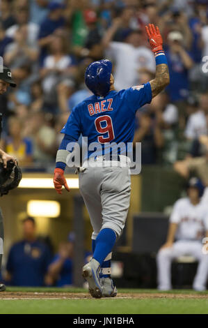 Milwaukee, WI, USA. 28th July, 2017. Chicago Cubs second baseman Javier Baez #9 hits a solo home run in the 8th inning of the Major League Baseball game between the Milwaukee Brewers and the Chicago Cubs at Miller Park in Milwaukee, WI. John Fisher/CSM/Alamy Live News Stock Photo