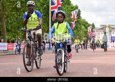 London, UK.  29 July 2017.  Members of the public ride down The Mall during the Prudential RideLondon FreeCycle, an 8 mile course in the centre of the capital, taking in in iconic landmarks en route.  The event is part of Prudential RideLondon's three day celebration of cycling with over 100,000 people participating over the weekend.   Credit: Stephen Chung / Alamy Live News Stock Photo
