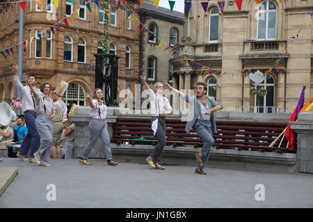 Hull,UK,29th July2017,A Duckie Summer Tea Party takes place in Hull as part of LGBT 50. MC Amy Lamé and her waiters serve tea to the people of Hull outside City Hall. Music was provided by London Gay Big Band©Keith Larby/Alamy Live News