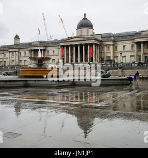 Trafalgar Square. London. UK 29 July 2017 - Reflection of National Gallery on a rainy day. Credit: Dinendra Haria/Alamy Live News Stock Photo