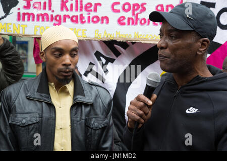 London, UK. 29th July, 2017. Stafford Scott (R) speaks on behalf of Mr Charles(L) father of Rashan Charles whose son Rashan died after being followed by police into a convenience store in east London. Credit: Thabo Jaiyesimi/Alamy Live News