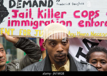 London, UK. 29th July, 2017. Rashan Charles father Partric charles (c) at a vigil and protest over the death of his son Rashan Charles. Credit: Thabo Jaiyesimi/Alamy Live News Stock Photo