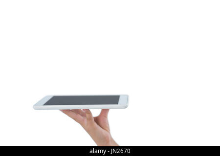 Hand of kid holding digital tablet against white background Stock Photo