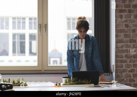 Beautiful woman using laptop in the cafe Stock Photo