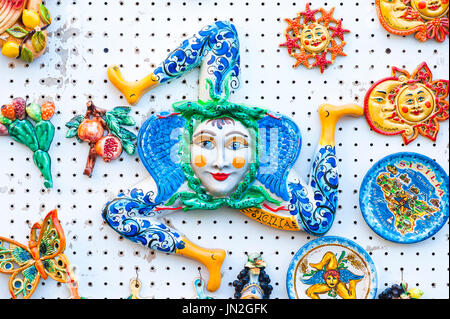 Sicily symbol, a ceramic trinacria, the national symbol of Sicily, for sale on a display board in Ortigia, Syracuse,Sicily. Stock Photo