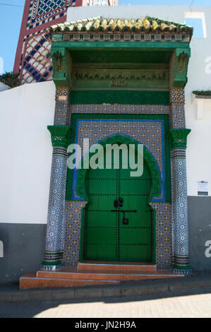 Morocco: door of the Sidi Bou Abib Mosque, a mosque overlooking the Grand Socco medina area of Tangier, built in 1917, decorated in polychrome tiles Stock Photo