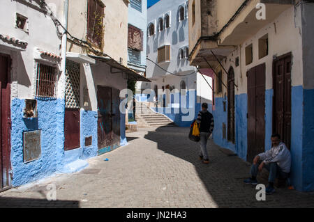 People in the narrow alleys of Tangier, city on the Maghreb coast with its unique blend of cultures, for centuries the Europe's gateway to Africa Stock Photo
