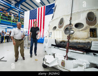 NASA Administrator Charles Bolden, left, and SpaceX CEO and Chief Designer Elon Musk, view the historic Dragon capsule that returned to Earth on May 31 following the first successful mission by a private company to carry supplies to the International Space Station on Wednesday, June 13, 2012 at the SpaceX facility in McGregor, Texas.  Bolden and Musk also thanked the more than 150 SpaceX employees working at the McGregor facility for their role in the historic mission. .Mandatory Credit: Bill Ingalls / NASA via CNP