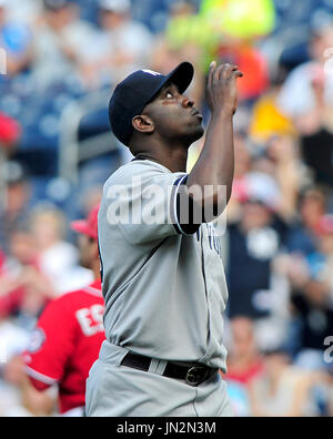 New York Yankees closing pitcher Jonathan Loaisiga throws during the ninth  inning in the first baseball game of a doubleheader against the Texas  Rangers in Arlington, Texas, Tuesday, Oct. 4, 2022. The Yankees won 5-4.  (AP Photo/LM Otero Stock Photo