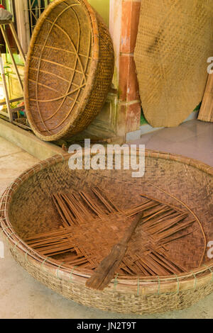 Traditional round woven bamboo boats being made in rural Vietnam Stock Photo