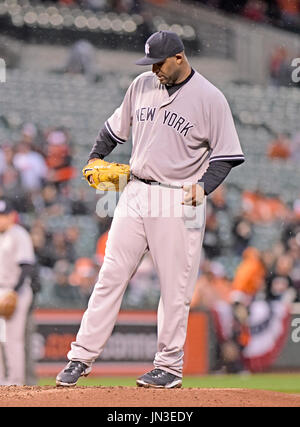 Baltimore Orioles starting pitcher Adam Eaton throws to a Chicago