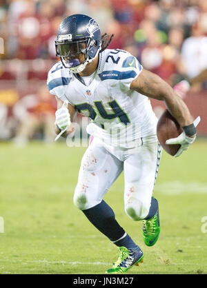 Seattle Seahawks running back Marshawn Lynch (24) walks the sidelines as he  sits out the fourth quarter in the against the New Orleans Saints at  CenturyLink Field in Seattle, Washington on December