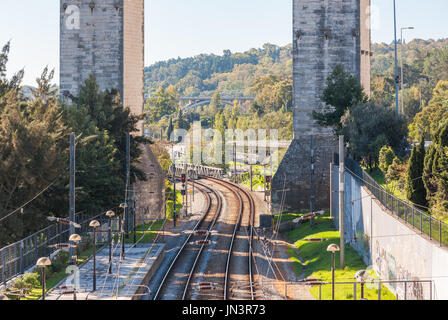 Railways under the  Aqueduct of the Free Waters at the Campolide station in Lisbon, Portugal Stock Photo