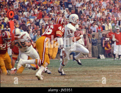 Washington Redskins wide receiver Frank Grant carries the ball and