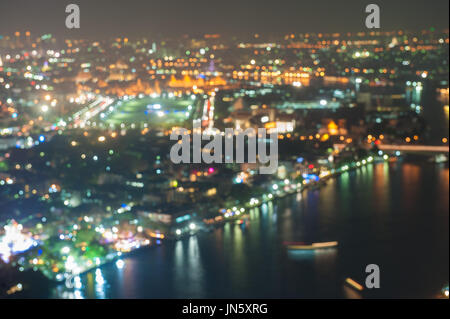 De-focused image Abstract blurred bokeh lights city skyline over Bangkok city Stock Photo