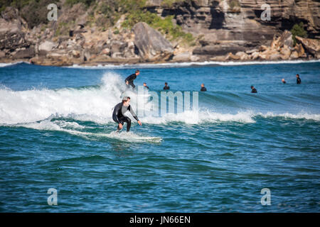 Men surfing on the waves at Avalon beach,Sydney,Australia Stock Photo