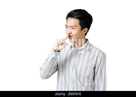 Portrait of a young asian businessman smiling and showing sign hands for shut up. Isolated on white background with copy space and clipping path Stock Photo