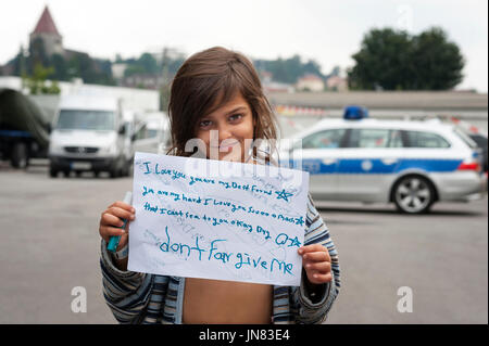 Passau, Germany - August 2th, 2015: Afghanistan girl named Nasila in refugee camps, Passau Stock Photo