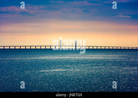 Oresund Bridge crossing the Oresund Strait, connecting Copenhagen Denmark and Malmo Sweden Stock Photo