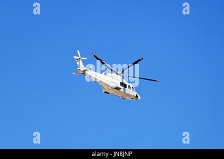 Rome, Italy - October 12, 2016: Helicopter in the sky of Rome, Italy Stock Photo
