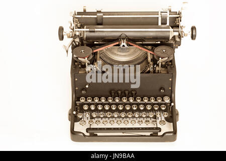 Portable old vintage typewriter isolated over white background Stock Photo
