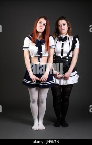 Twin sisters in a cosplay shoot. Stock Photo