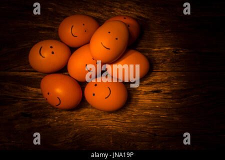 brown eggs with happy face and friends Stock Photo