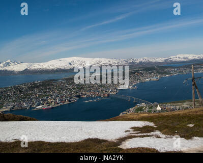 Looking down on Tromso City from Fjellstua viewpoint  panoramic view of the archipelago beautiful historic  town centre and the amazing Sunnmøre Alps  Stock Photo