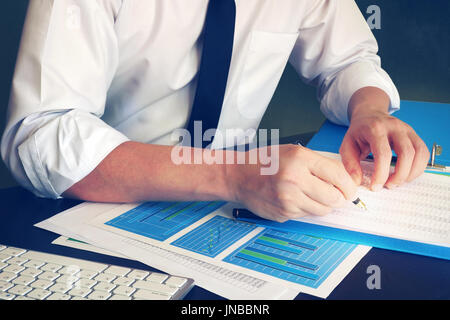 Finance manager are checking financial job results. Stock Photo
