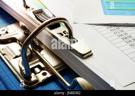 Pile of business documents in a folder in an office. Stock Photo