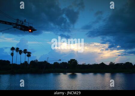 Quiet Waters Park Lake at Dusk with Ski Rixen Cable Pully System Platform Above Stock Photo