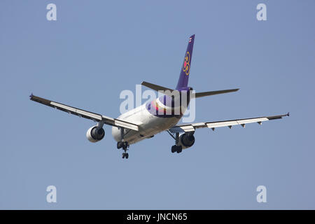 CHIANGMAI , THAILAND - FEBRUARY 5 2014: HS-TAZ Airbus A300-600 of Thaiairway. Landing to Chiangmai airport from Bangkok Suvarnabhumi. Stock Photo