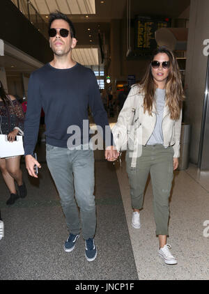 Eli Roth and his wife Lorenza Izzo arrive at Los Angeles International ...