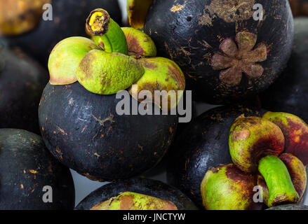 Closeup pile of mangosteen ,sweet tropical fruit Stock Photo