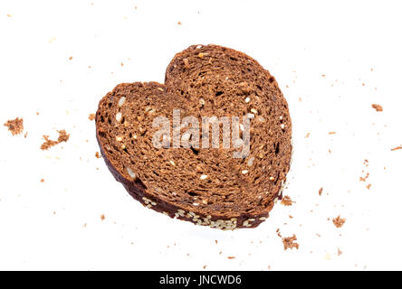 Heart made from bread on white background Stock Photo