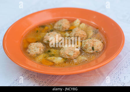 fish soup with salmon balls on plate Stock Photo
